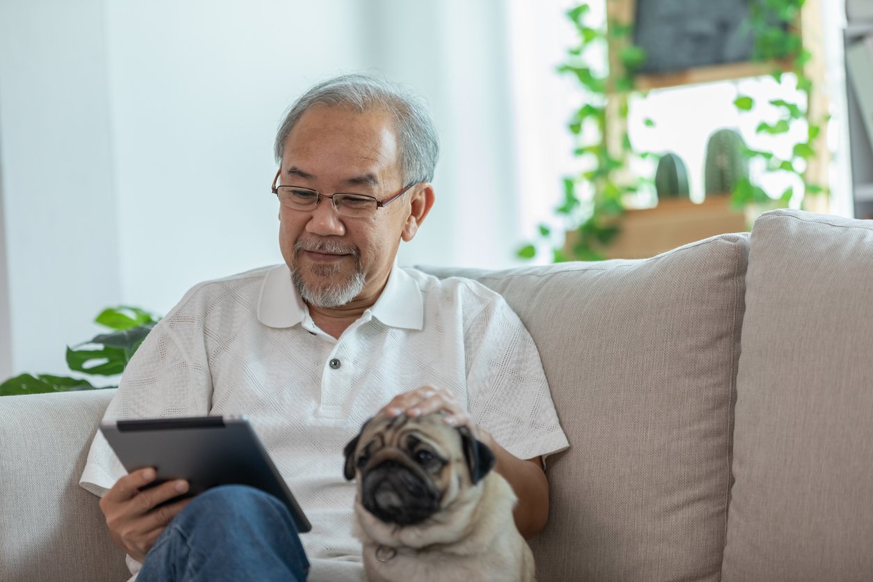 Man Using Tablet at Home